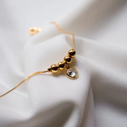 Pulsera 4 Bolitas Zirconia Blanca 18 cm